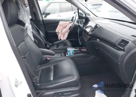 2021 Honda Pilot 2Wd Touring 8 Passenger z USA, uszkodzony, nr VIN 5FNYF5H91MB010304